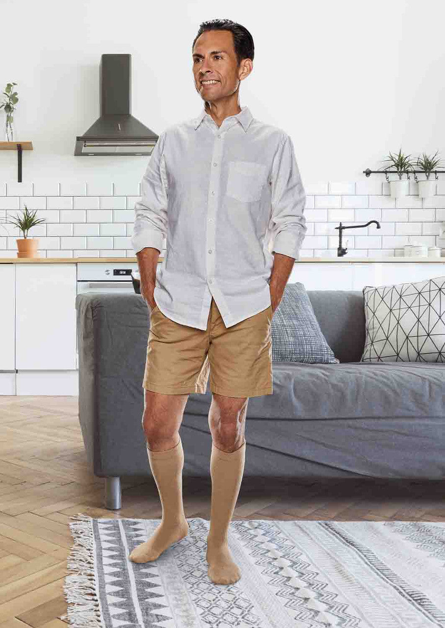 Man wearing Core-Spun moderate support compression socks in khaki