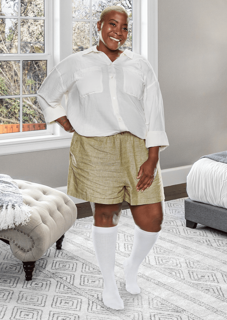 Man wearing Core-Spun mild support compression socks in white